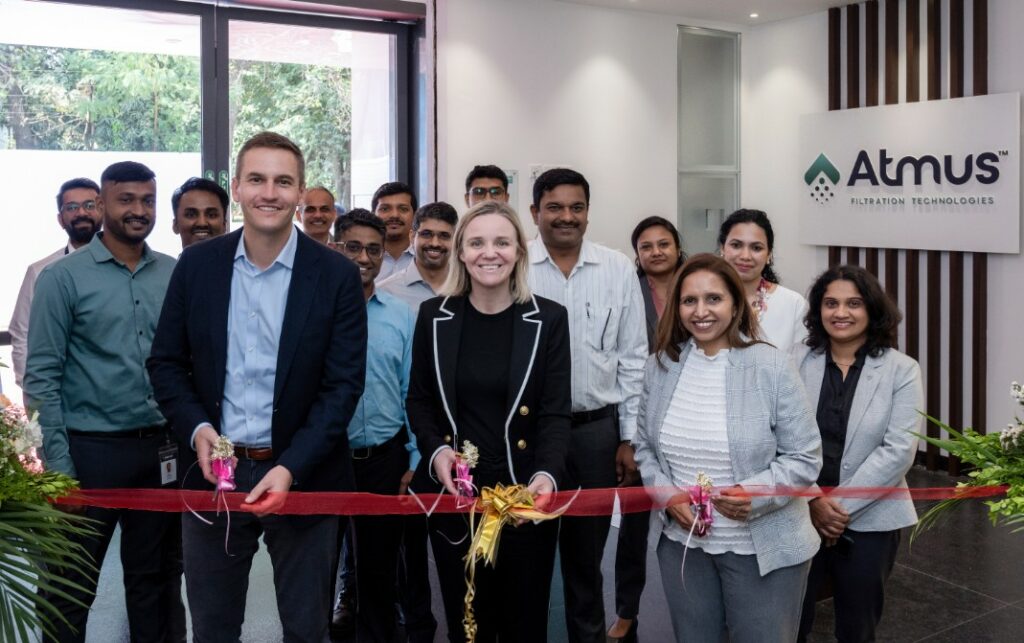 Jack Kienzler, Steph Disher and Avani Shah join Atmus employees at the inauguration of the Pune Technical Center (Photo: Business Wire)