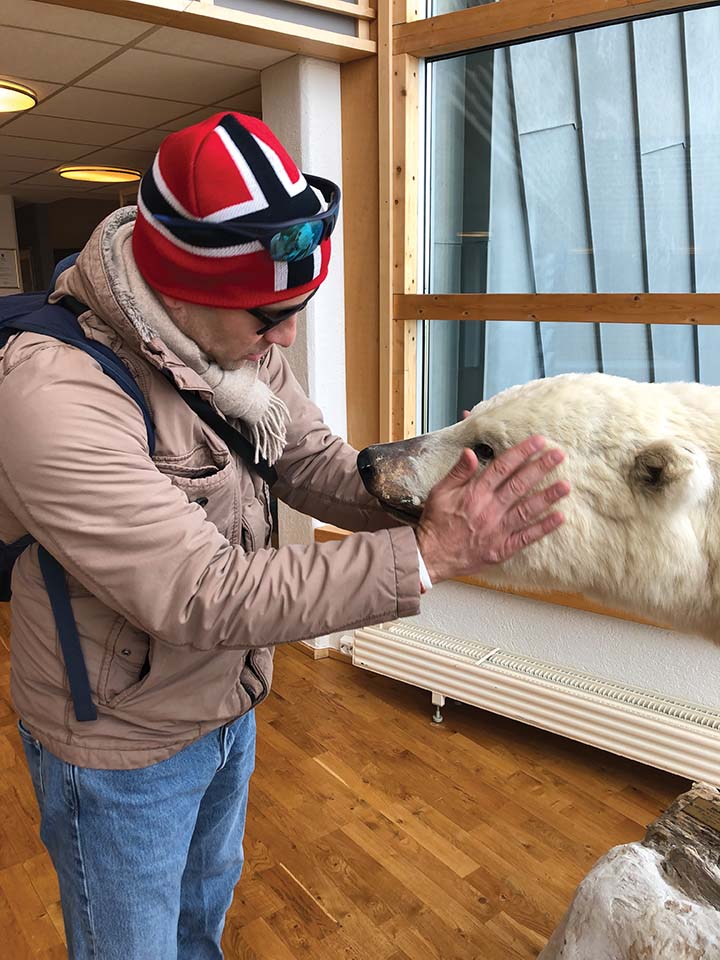 Longyearbyen: Examining a mummified polar bear.